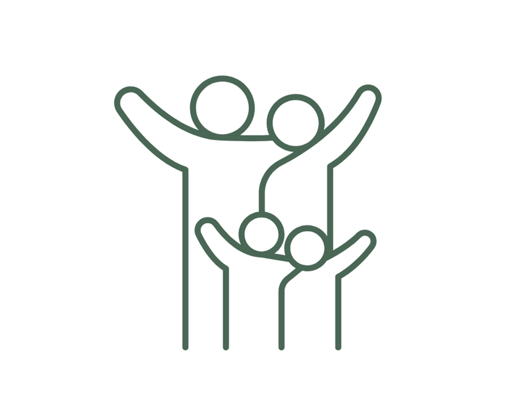 Two adults and two children with raised arms in a celebratory pose.